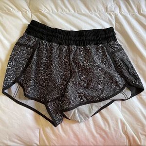 Lululemon track shorts. Black & white design. Size 8. Gently worn.